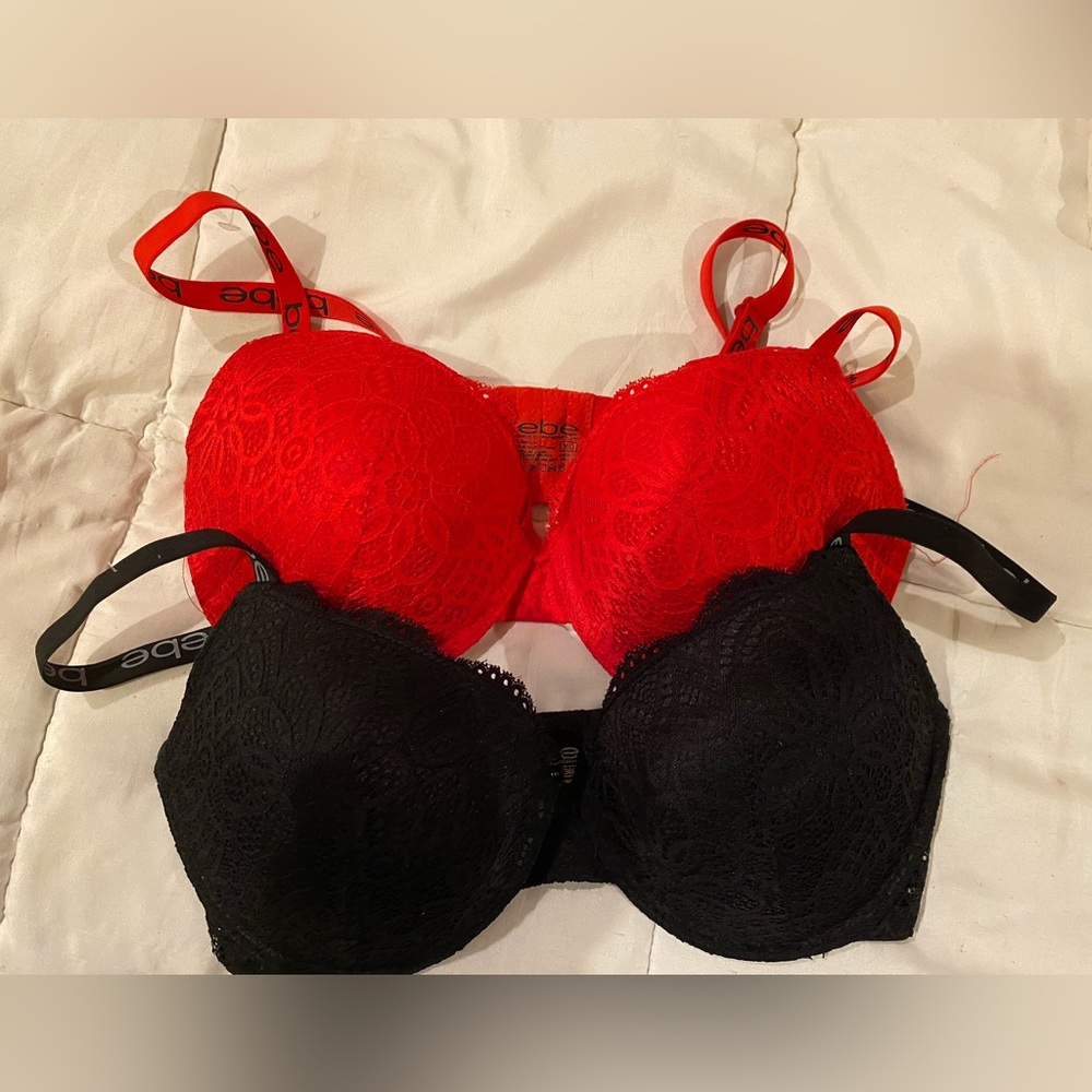2 Bebe bras, black and red size 36D. NWOT. Lace front and some padding.